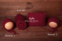 Image 2 of Handknitted pillow wrap bonnets red