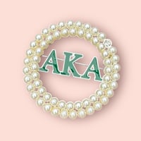 AKA Brooch