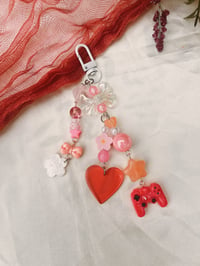 Image 2 of trinket keychains <3