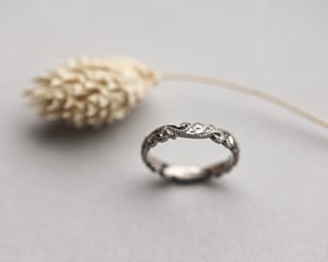 Image of 18ct white gold 3mm floral carved ring