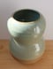 Image of tall celadon wavy vase