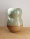 Image of tall celadon wavy vase