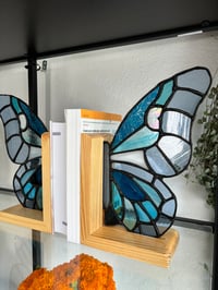 Image 1 of Winter blues butterfly bookends