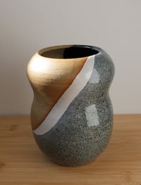 Image 2 of black and white swoop vase