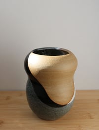 Image 1 of black and white swoop vase