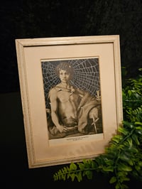 Image 2 of "John the Baptist" antique page with preserved spider web