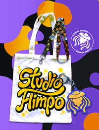 Image 1 of Studio Flimpo Apparel Bundle | Tote bag, acrylic charm, and lanyard