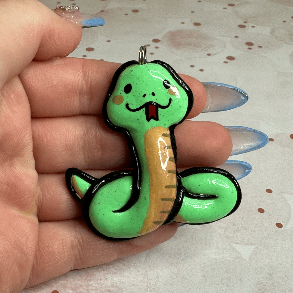 Image of Cartoon Snake Charm