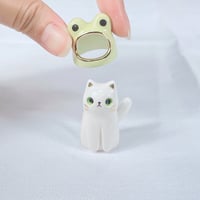 Image 3 of white cat with frog hat ceramic figurine