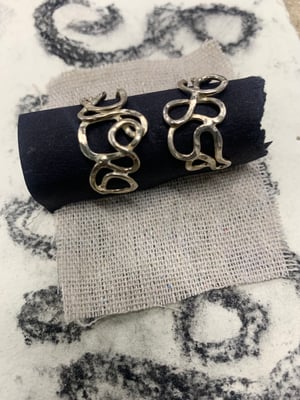 Image of "The Listening Wind" sculpted recycled silver hoops