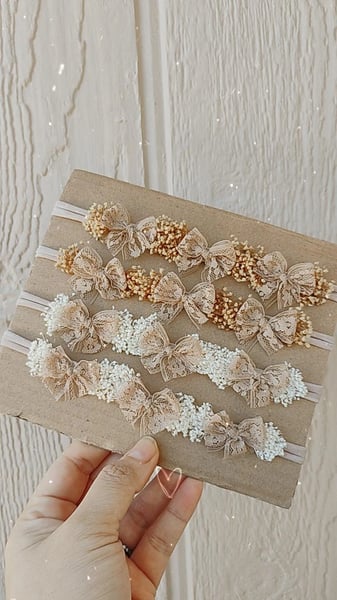 Image of Latte  lace multiple bows tieback with babies breath