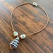 Image of Hawaiian Hebrew Cone Shell Necklace with Puka Shells and Sea Glass 