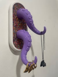 Image 4 of Double purple tentacle jewelry holder on white oval sprinkle base