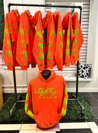 Image 1 of LOVE HEALS ORANGE / GREEN