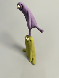 Image 4 of Purple thing stood on a green thing