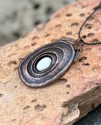 Image 1 of Inner strength. Limpet-inspired pendant with white howlite stone