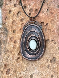 Image 3 of Inner strength. Limpet-inspired pendant with white howlite stone