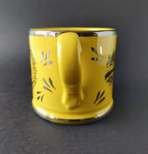 Dog canary lustre mug