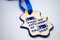 Image 1 of Three gay cats looking at each other, Christmas ornament 
