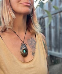 Image 5 of Inner Peace. Limpet Inspired Pendant with blue howlite stone