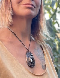 Image 4 of Inner strength. Limpet-inspired pendant with white howlite stone