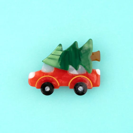 Image of Clip coche con árbol de Navidad