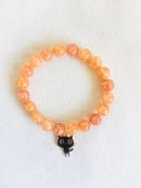 Image 2 of Orange beaded Cat charm stretch bracelet 