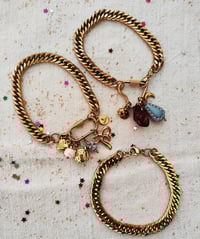 Image 2 of Bracciale in acciaio dorato