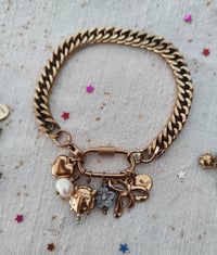 Image 3 of Bracciale in acciaio dorato