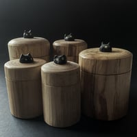 Image 1 of Black Cat Storage Canister
