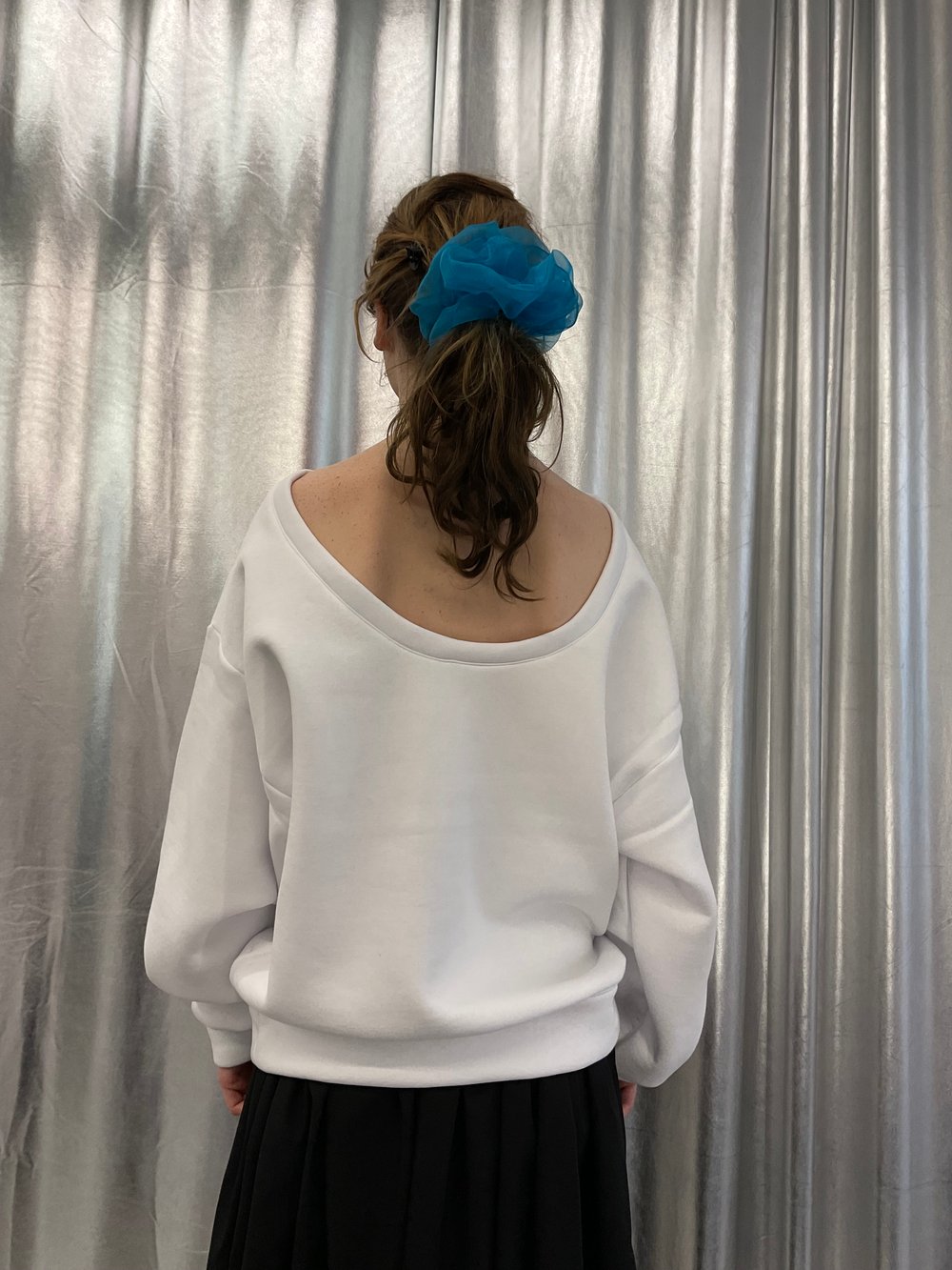 White oversized sweatshirt with open back 