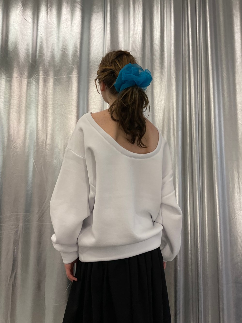 White oversized sweatshirt with open back 