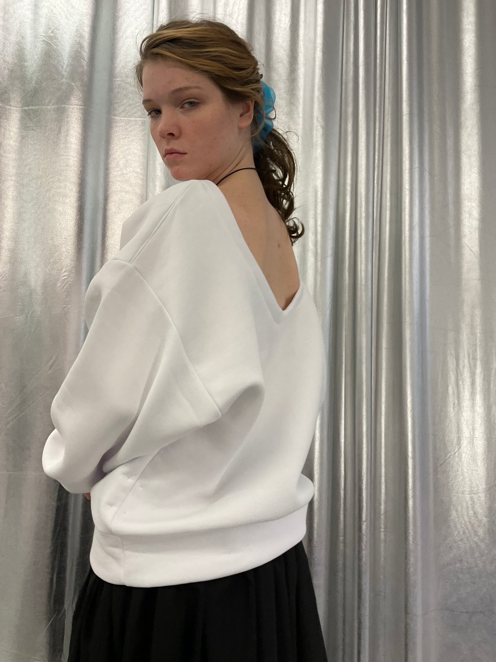 White oversized sweatshirt with open back 