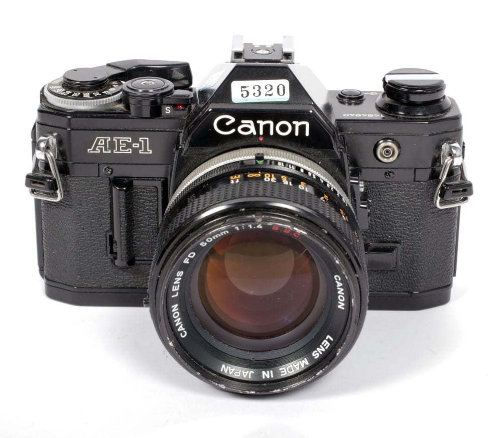 Image of BLACK CANON AE-1 35mm SLR Film Camera with 50mm F1.4 Lens