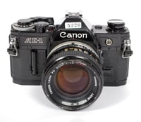 Image 1 of BLACK CANON AE-1 35mm SLR Film Camera with 50mm F1.4 Lens
