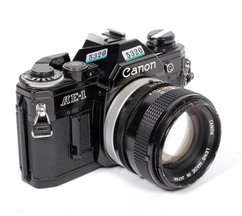 Image of BLACK CANON AE-1 35mm SLR Film Camera with 50mm F1.4 Lens