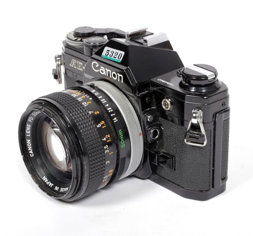 Image of BLACK CANON AE-1 35mm SLR Film Camera with 50mm F1.4 Lens