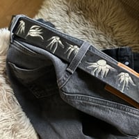 Image 1 of BLACK OR ANTIQUE BROWN ‘PAINTED’ FLANNEL FLOWER BELT