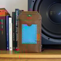 Image 1 of Funda de móvil marrón y azul