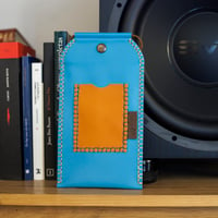 Image 1 of Funda de móvil azul y naranja