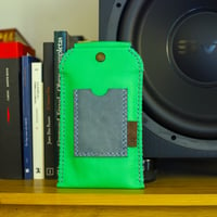 Image 1 of Funda de móvil verde y azul