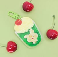 Image 1 of Melon Soda Puppy Shaker Keychain