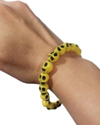 Image 2 of Yellow Skull Bracelet (Size Medium)