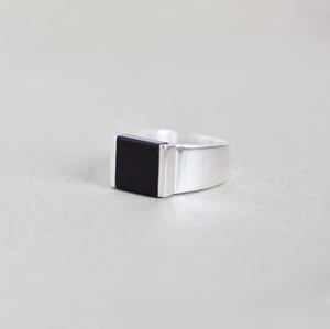 Image of Black Agate step cut wide band solid framed silver ring