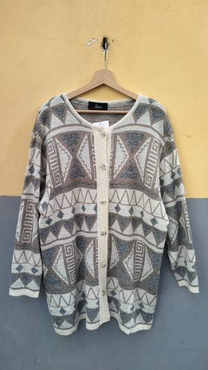 Cardigan fantasia geometrica