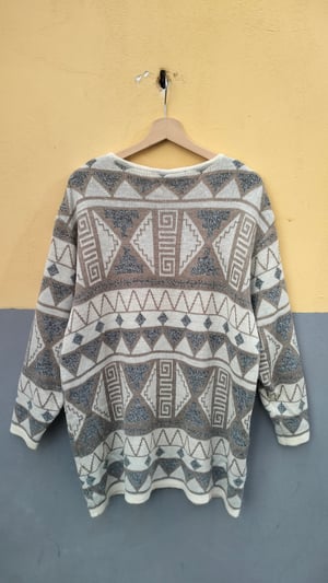 Cardigan fantasia geometrica