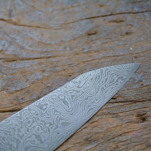 Image of Gyuto 235x52 random damascus