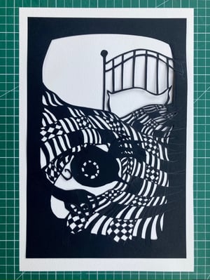 Image of original paper cut-out "Flyboy hiding under the covers"