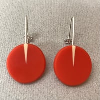 Image 1 of bright orange circle drop earrings