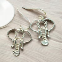 Image 2 of Small Wire Elephant Head Dangle Earrings Silver